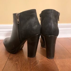 Black leather booties with suede back